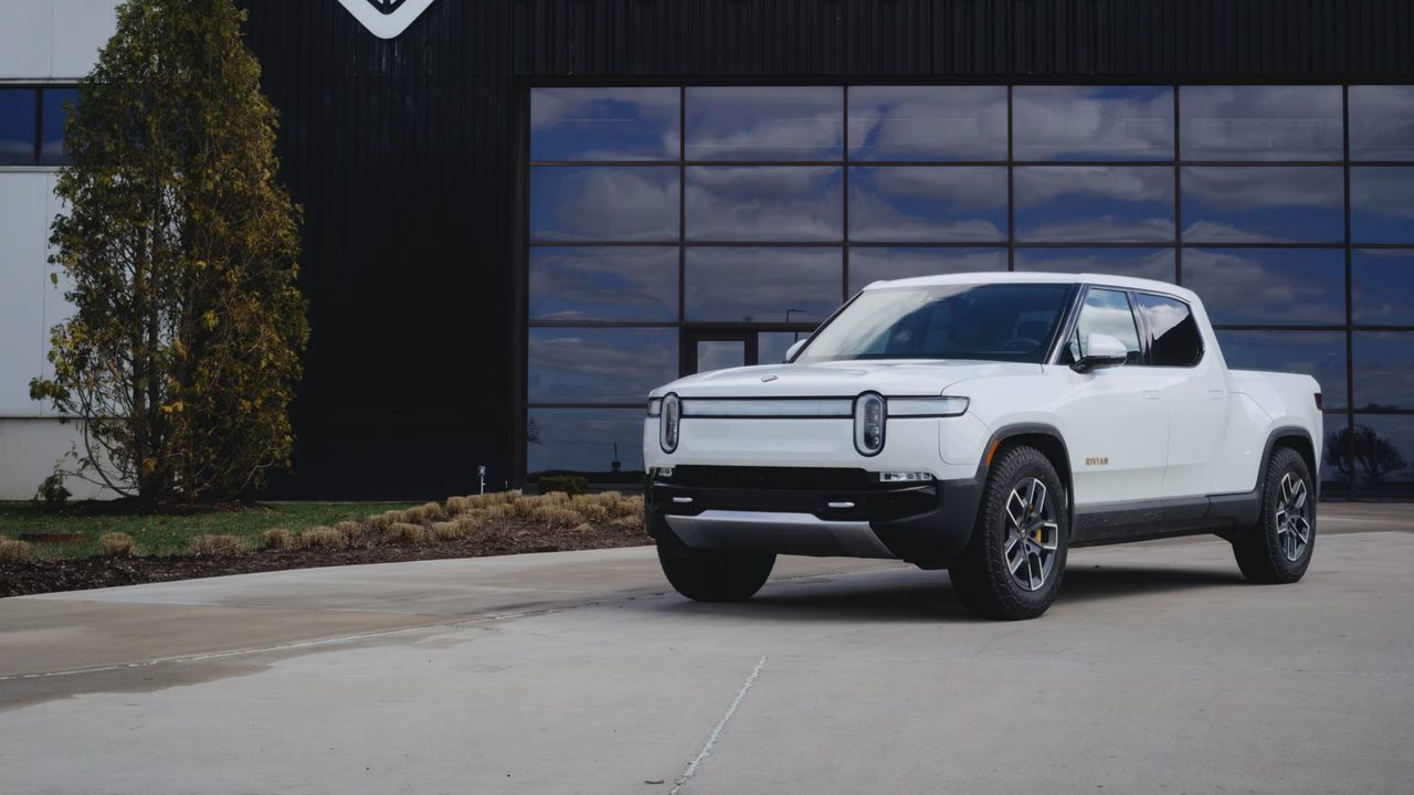 Rivian R1T parked outside Rivian's Normal, Illinois manufacturing plant